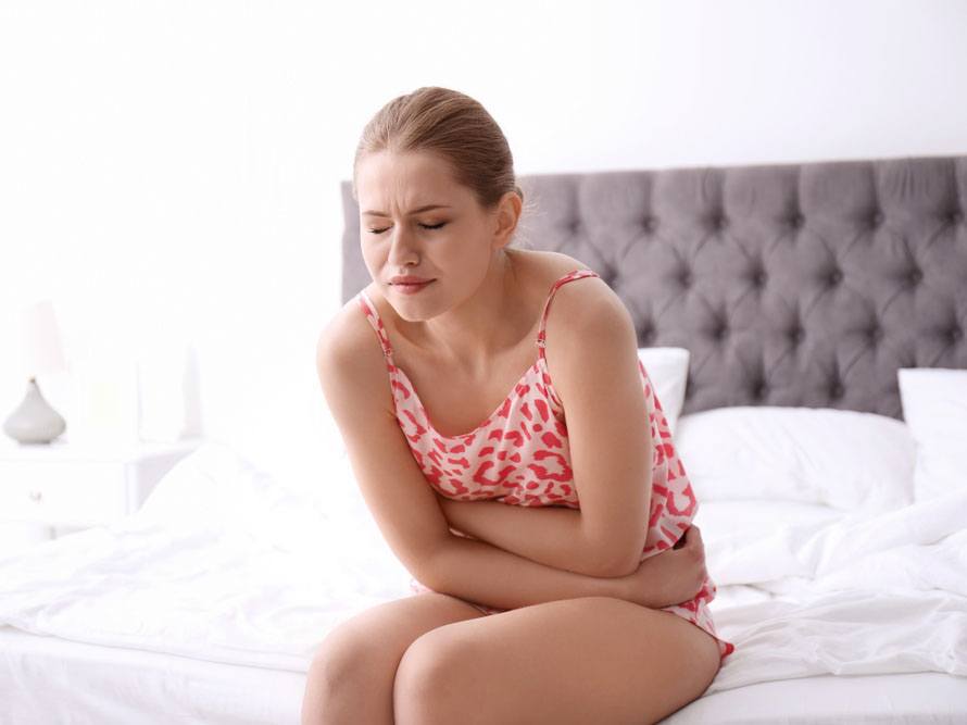 Woman suffering with endometriosis