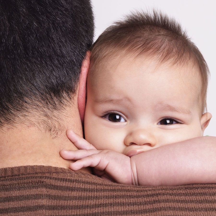 Man holding a baby