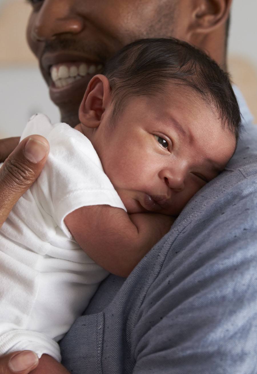 Man holding a baby